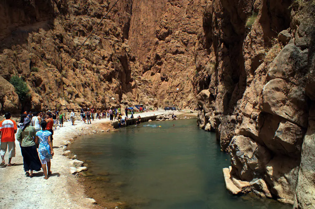 Walkers in the Todra Gorge canyon between Tinghir and Merzouga